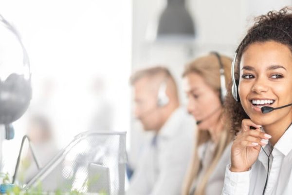 Call center worker accompanied by her team.